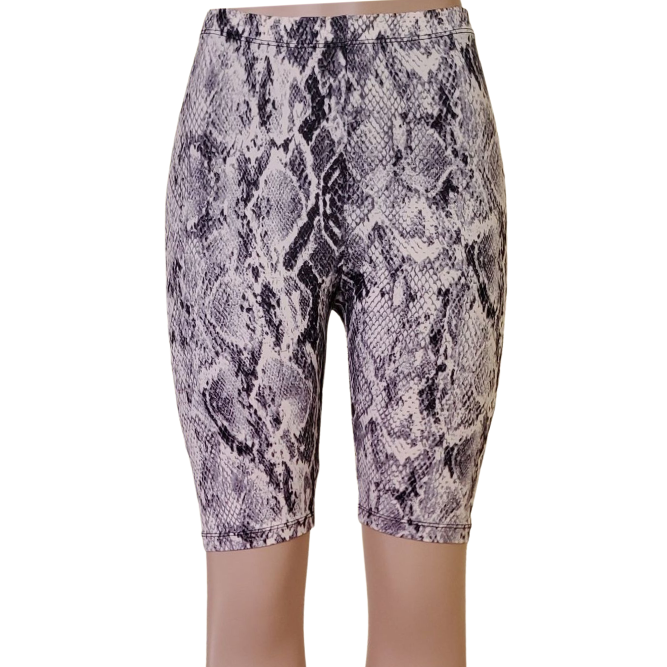 Women's snake print biker shorts in black and white, trendy and stylish for casual or active wear.