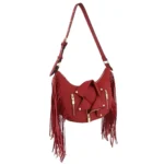 A red handbag with matching red fringe and a miniature biker jacket design.
