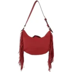 Back view of a red crescent shoulder bag featuring matching red fringe along both sides.