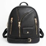 Women's soft grain navy vegan leather moto backpack with front zipper and buckle details