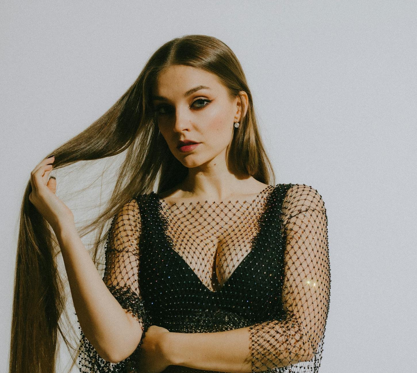 model in a mesh top with rhinestones