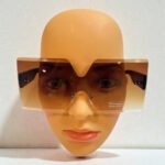 Women's oversized rimless sunglasses featuring brown gradient lenses and a sleek, vintage-inspired design with UV400 protection.